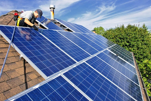 a solar panel being installed efficiently on the roof of a property